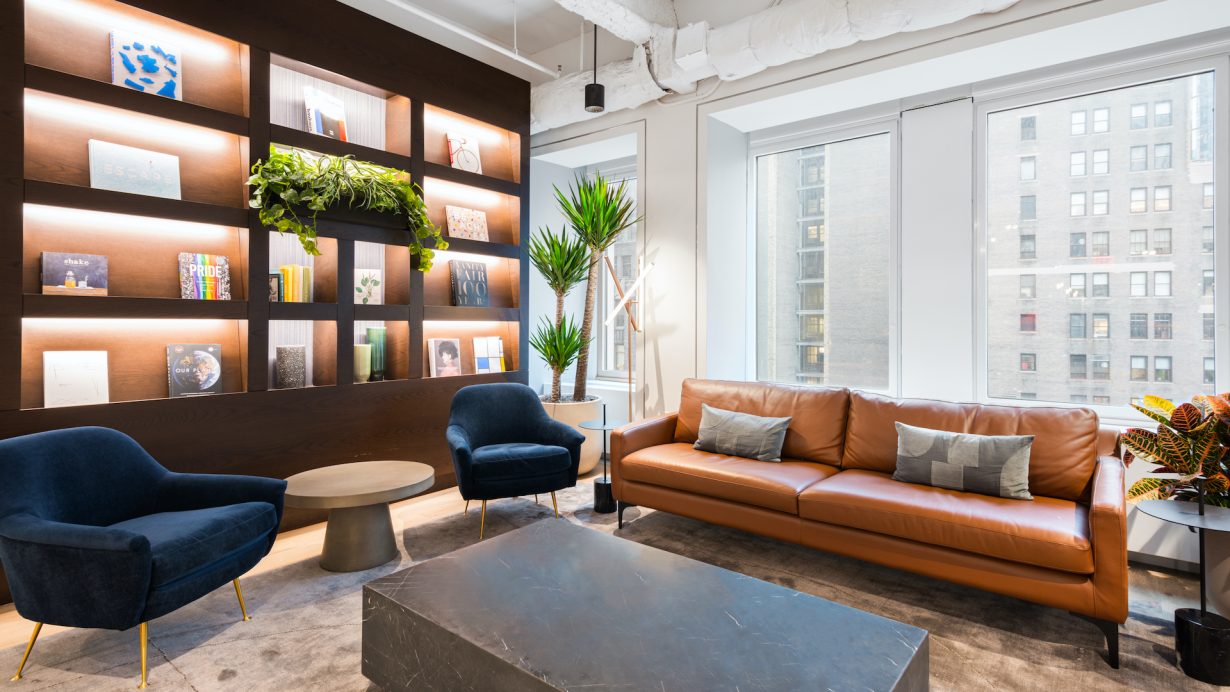 Members and visitors can flip through books on art and culture in the lobby area.