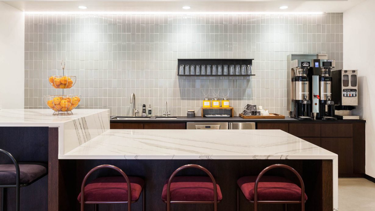 Members can head to the kitchen for complimentary craft coffee and teas as well as a daily breakfast and afternoon snack.