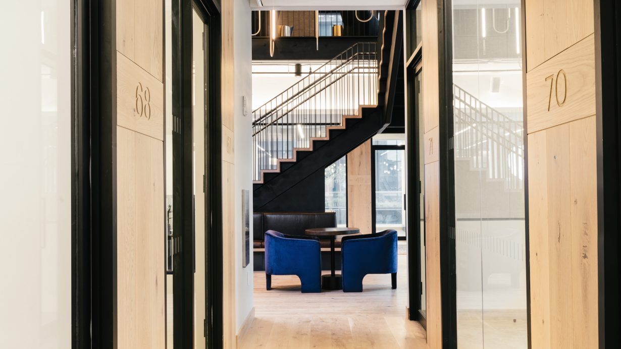 White oak flooring adds warmth to Industrious at Equinox.