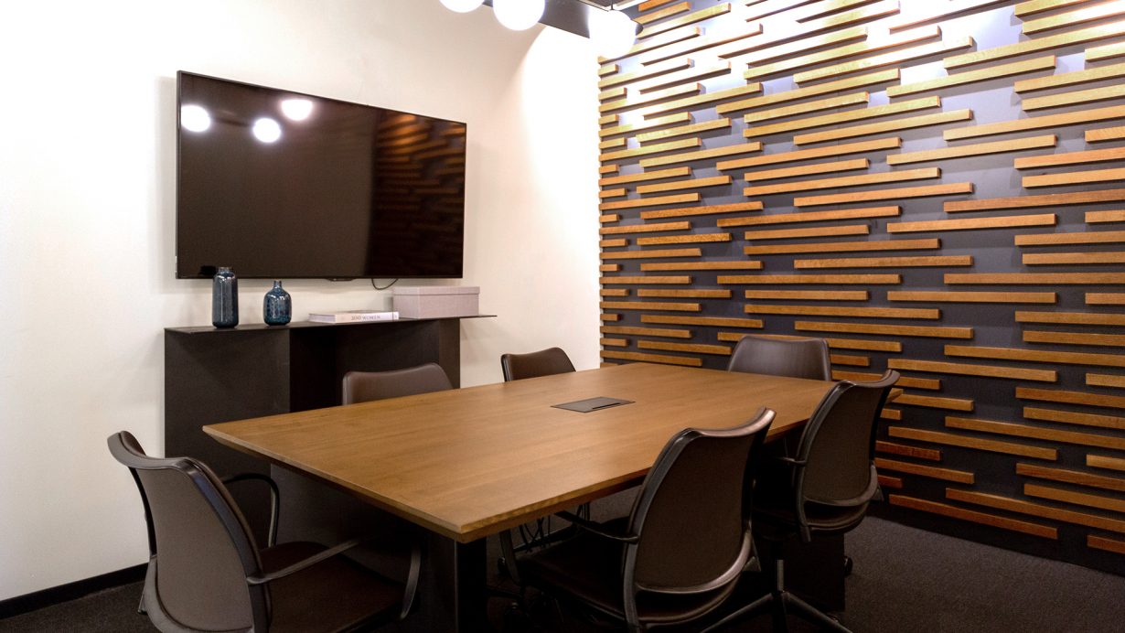 Conference rooms have A/V equipment for video calls.