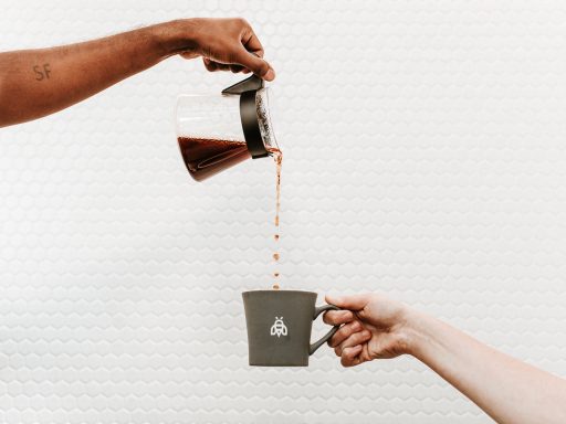 Pouring a fresh cup of coffee at Industrious Bellevue, outside Seattle. (Aspen Jeanné Photography)