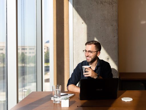 Industrious Design Manager Stephen Tortorella working out of Industrious Plano in Texas.