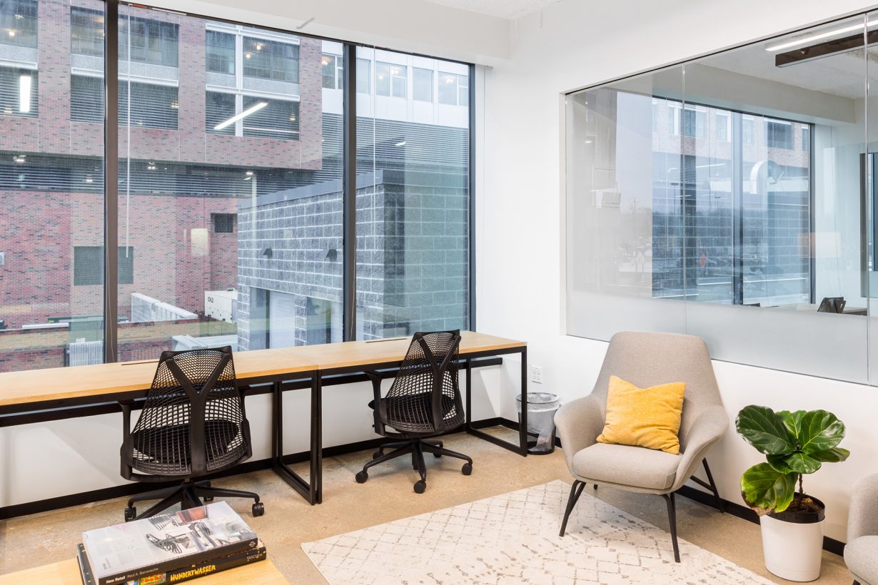Offices are move-in ready, with oak desks and ergonomic chairs.